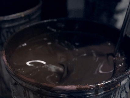 An Ink Technician is mixing ink in slow motion